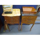 A pair of French walnut bedside chests with unmatched marble tops