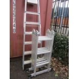 Two folding aluminium step ladders