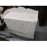 A modern white painted pine, nine drawer chest on a plinth, 37 h, 36 w