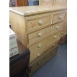 A modern pine chest of six drawers, raised on a bracket plinth, 46 h, 36 w