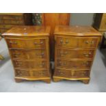 A pair of reproduction, yew wood chests of four short drawers, 29 1/2h x 20w