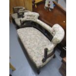 A late Victorian mahogany framed, three piece salon suite, comprising a pair of tub chairs and a