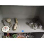 Early 20th century silver topped and cut glass dressing table pots, a hair tidy and part dressing