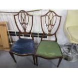 A pair of early 20th century mahogany framed, shield back bedroom chairs