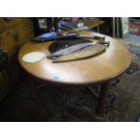 A G-Plan teak circular coffee table with inset glass centre, 18h x 38w