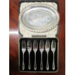 A set of six silver cake forks, Birmingham 1929, marks for Barker Bros Ltd, cased and a small EPNS