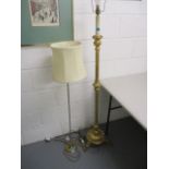 A modern gilt wood standard lamp with a turned column, 58 h and a brass standard lamp