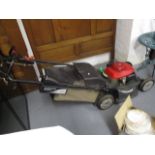 An electric start hydro static Honda lawnmower