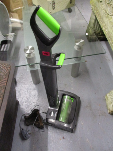 A portable/hand held GTech vacuum cleaner