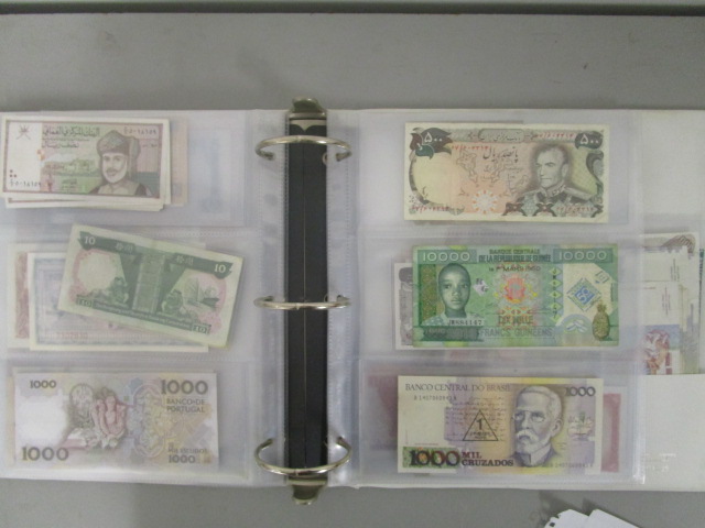 A folder of early to late 20th century banknotes to include a 1910 Russian 100 Roubles note, a - Image 3 of 4