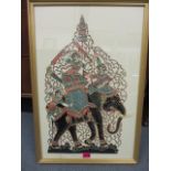 A mounted Indonesian cut out of warriors riding an elephant