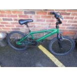 A green coloured BMX bike