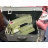 A retro Bernina sewing machine, serial number 67106185 in carrying case