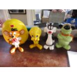 A selection of Warner Bros models depicting Tweetiepie, Speedy Gonzalez, Sylvester and Mutley, the