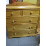 A pine chest of two short and three long drawers with a raised back on a plinth base, 41 h, 40 w, 17