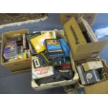 A mixed lot to include VHS tapes, Acornsoft games, an Aldis projector, Panasonic speakers and