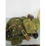 A mid to late 20th century army uniform, comprising a jacket, trouser and a cap, a selection of