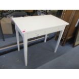 An early 20th century, white painted occasional table, 30 1/2h x 34 w