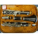 A Roshill Instruments clarinet, cased