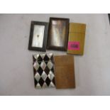 Five 19th century and later card cases to include three wooden examples, a mother of pearl and