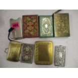 Eight 19th century and later metal and leather card cases to include a gilt example with Greek key