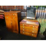 A 1940s oak dressing table, 57 1/2 h x 35 3/4 w, together with a matching tallboy, 49 h x 33w