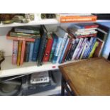 A mixed lot of books to include those on Jaguar, John Betjeman and novels by John Grisham