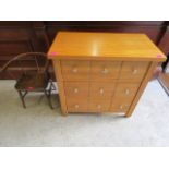 A modern oak CD rack/chest, together with a mahogany child's chair