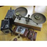 A mixed lot to include a set of scales, and cameras to include an Ilford Sportsman and two Brownie