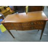 A late 20th century mahogany, serpentine fronted side table by Rackstraw Ltd, 32 7/8" x 42" x 17 7/