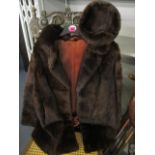 A vintage musquash fur coat and hat