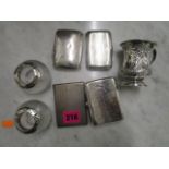 A selection of silver items to include a pair of machine threaded glass match strikers with silver