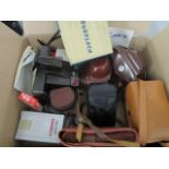 A selection of vintage cameras and accessories to include an Ilford leather cased camera