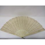 A 19th century French fan with pierced bone sticks, lace leaf and pierced guards, 14" h