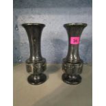 A pair of turned stone vases with engraved decoration, 7 7/8" h