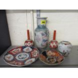 A pair of Kutani vases, Imari plates and Oriental ceramics