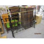 A Victorian black painted metal and brass bedstead, 54" w