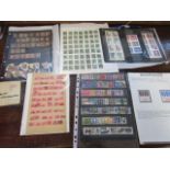 A collection of British stamps including Imperf Penny Reds and a George V and Elizabeth II range,