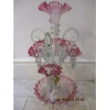 A Victorian glass cranberry tipped table epergne