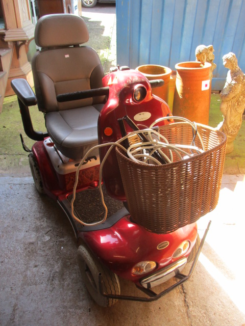 A Shopridger Deluxe mobility scooter with accessories