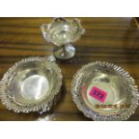 A pair of silver pin dishes and a silver bon bon dish