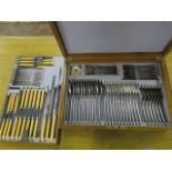 An oak cased silver plated canteen of cutlery, one fork replacement