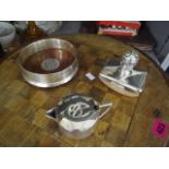 A small lot comprising a silver wine coaster, a small lidded jug and a silver blotter