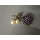 A 9ct gold filigree style brooch set with amethyst coloured stone and a pair of 9ct gold pearl