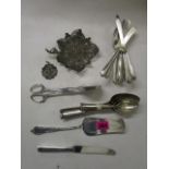 A selection of white metal and silver plated items to include an Indian white metal filigree leaf, a