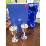 A pair of silver goblets