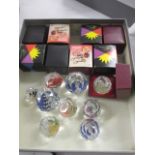 A selection of Swarovski and other small commemorative paperweights