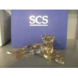 A boxed Swarovski Crystal Society model of a lion