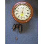 A Victorian wall clock in a circular mahogany case, with label for Fehrenbach, with weights and