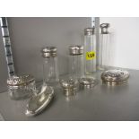 Silver and glass dressing table bottles and tops